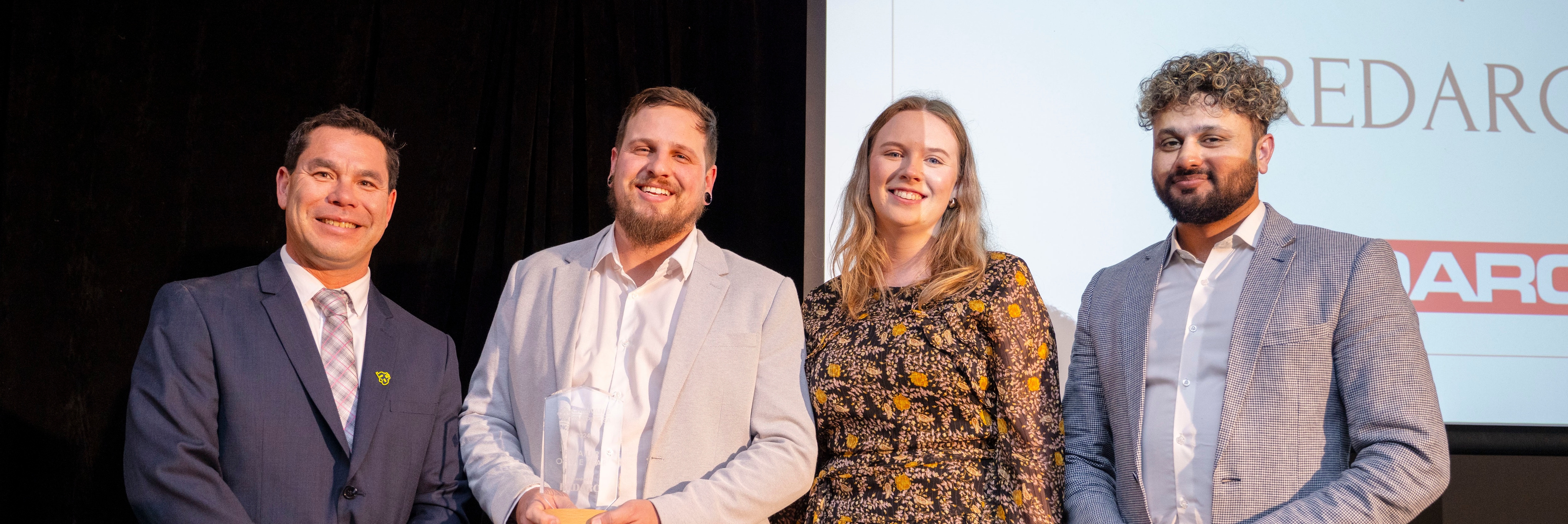REDARC staff at the Caravan & Camping SA Award dinner holding their awards