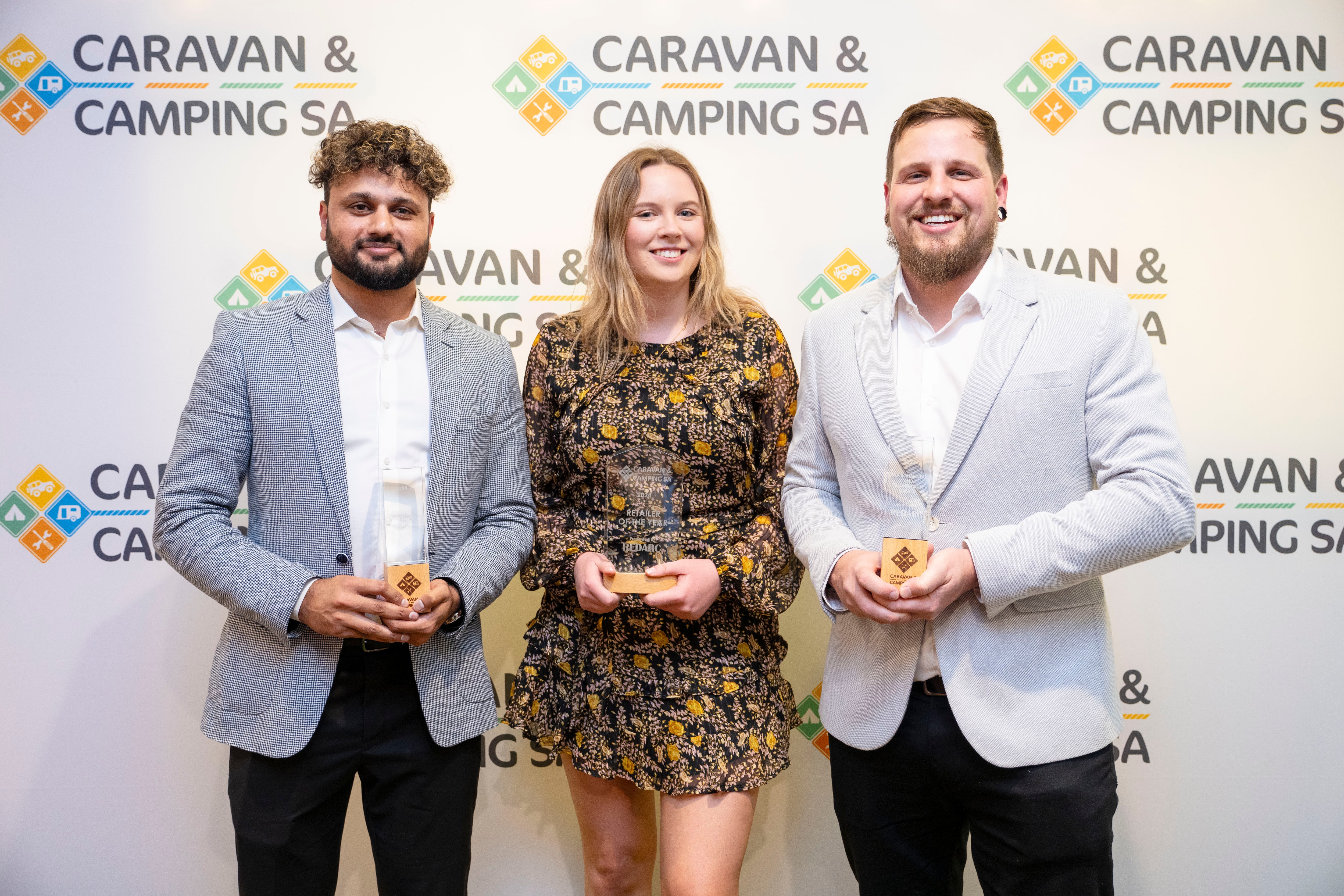 REDARC staff at the Caravan & Camping SA Award dinner holding their awards