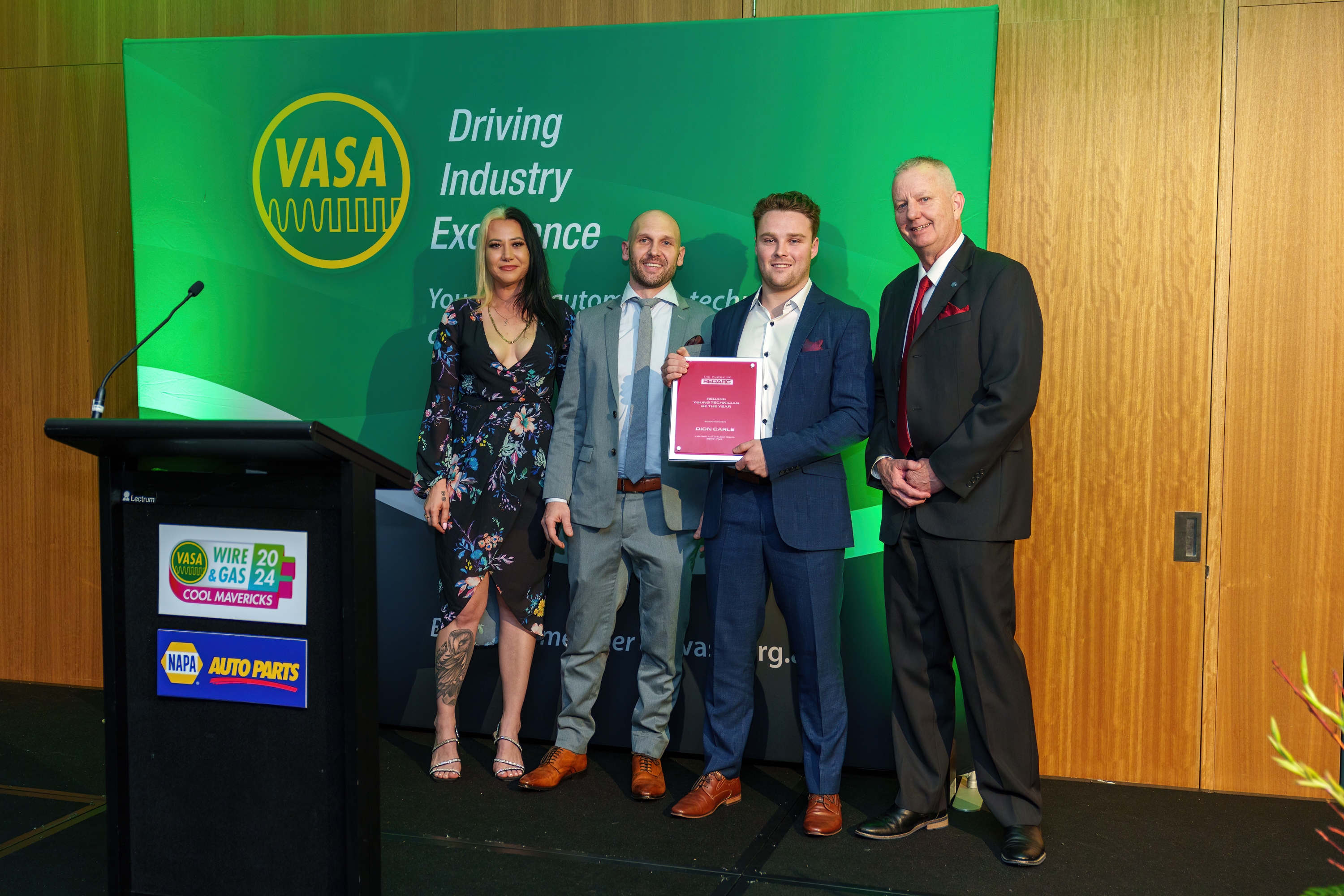 Dion Carle with his REDARC Young Technician of the Year Award alongside VASA representatives and David Schneiders. 